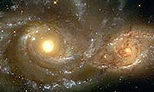 Hubble image of interacting Spiral Galaxies NGC 2207 and IC 2163